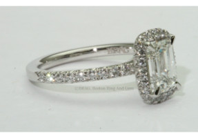 Emerald cut stone in cushion halo, cathedral band, platinum