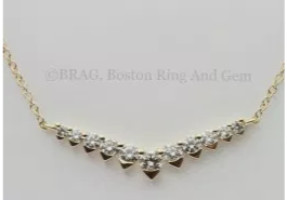 Diamond and 18k yellow gold V shaped Necklaces