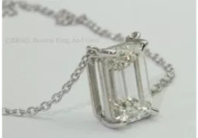 Emerald Diamond pendant set in platinum