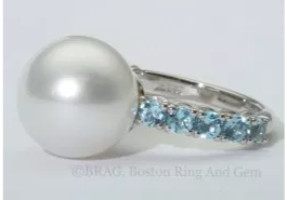 Pearl and blue topaz platinum ring